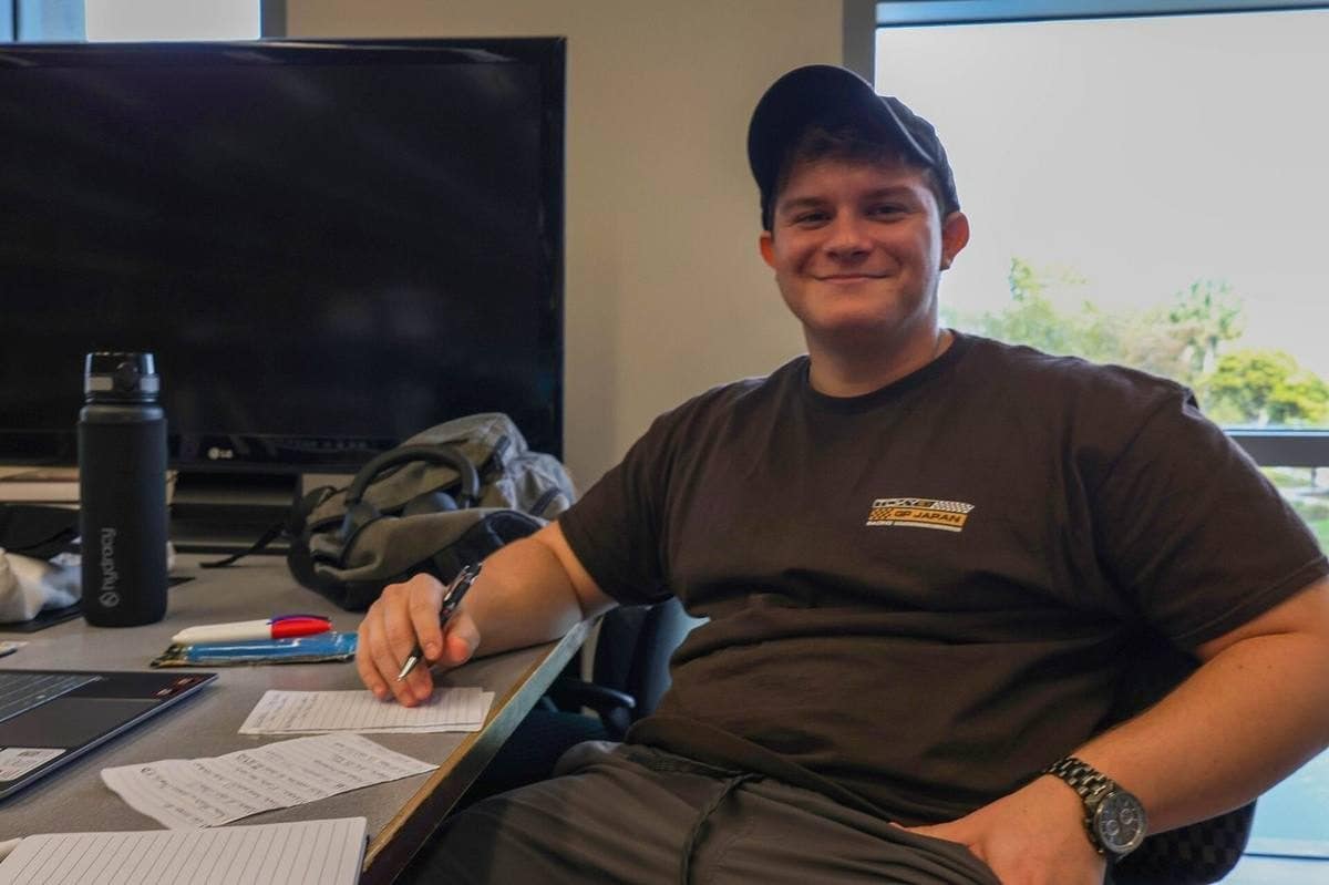 Student working on an application at a desk