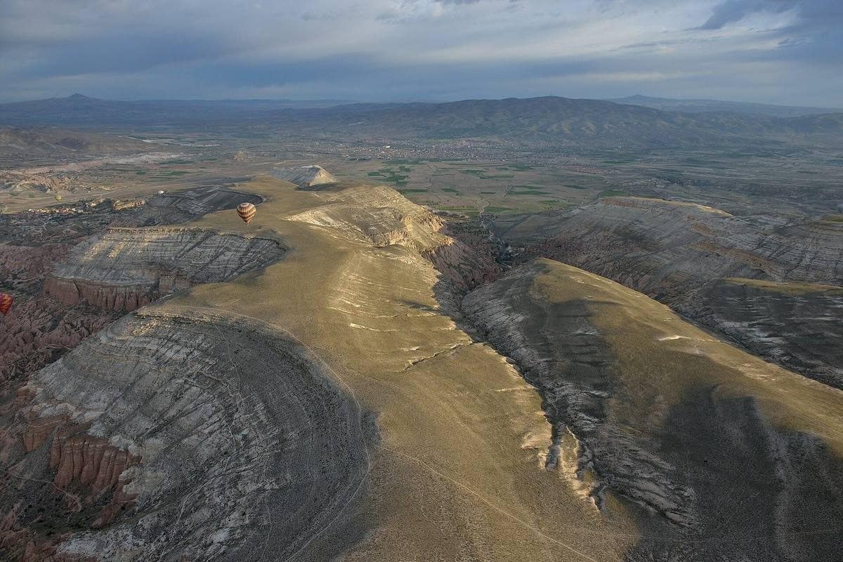 Hot air balloons over Cappadocia at sunrise